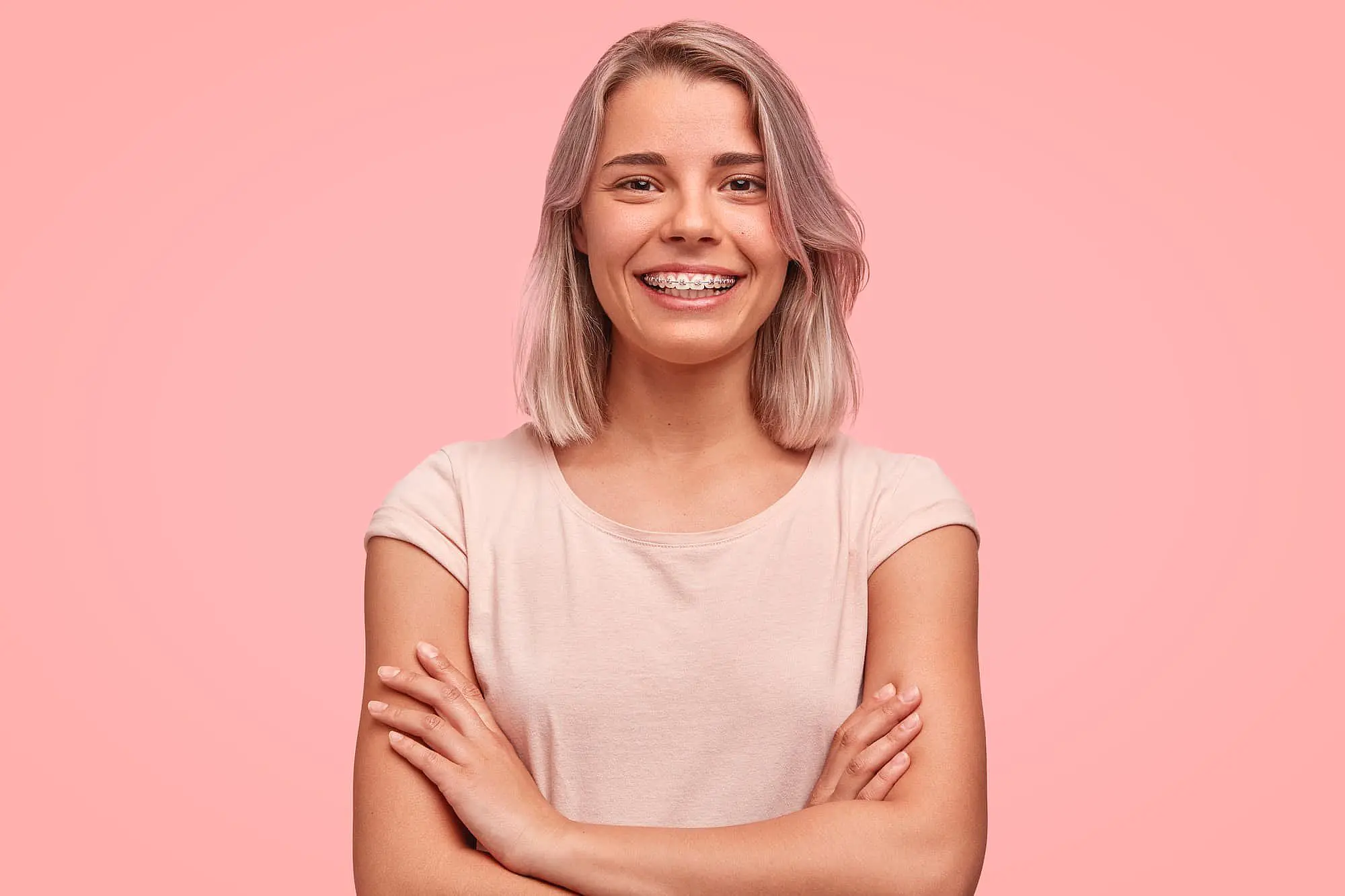 Woman smiling while getting a consultation for braces at Koerich Orthodontics in Charlotte, NC