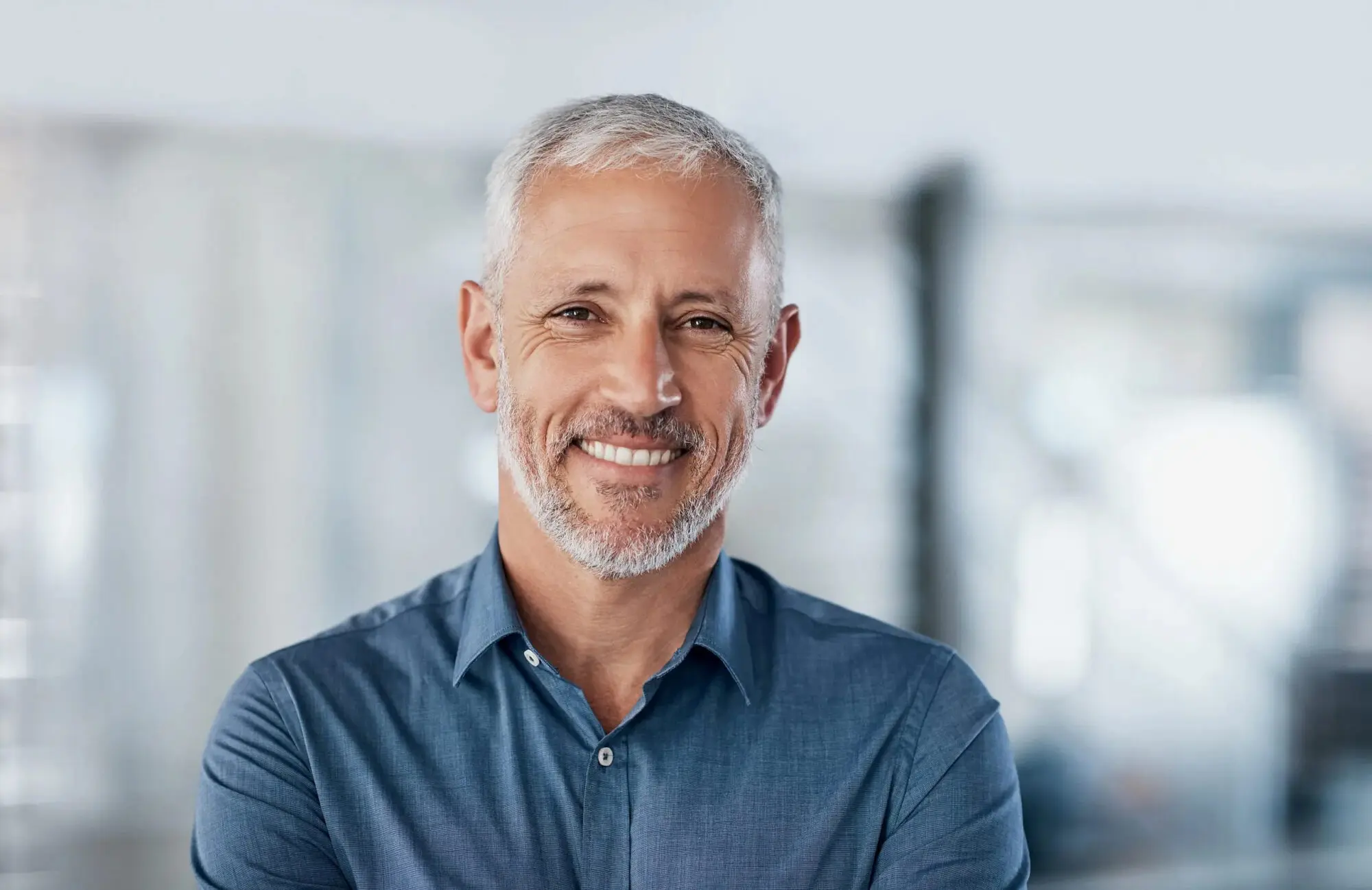 A adult happy smile with benefit adult orthodontics treatment from at Koerich Orthodontics in Charlotte, Indian Trail and Monroe, NC.
